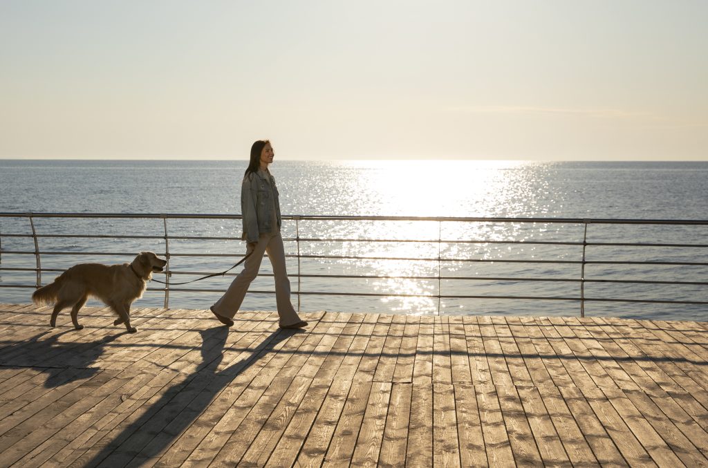 Dog owner enjoying time outdoors with their pet in Central Florida